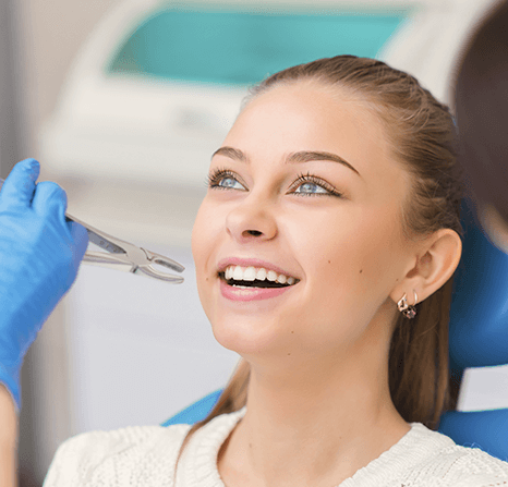 Patient getting her tooth looked at