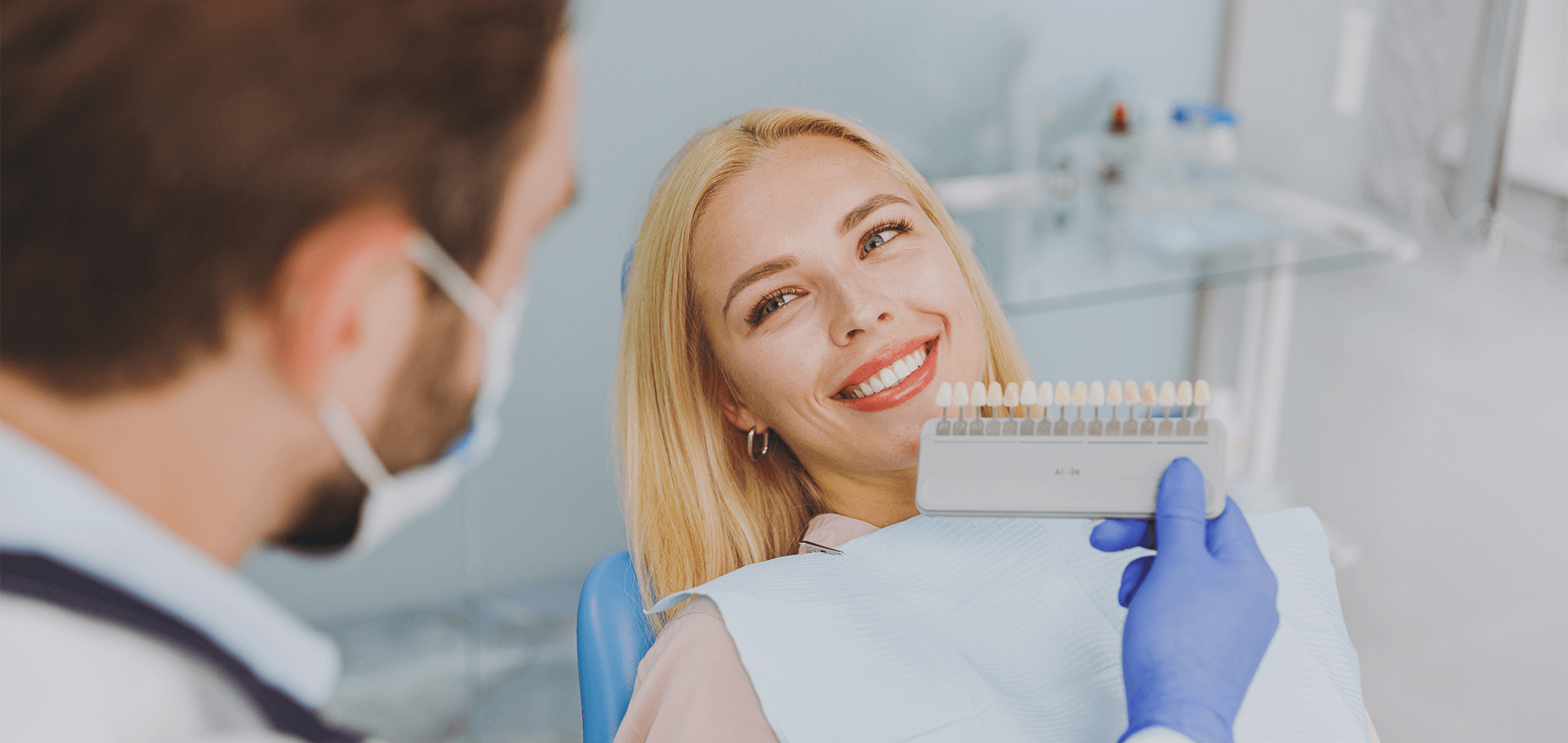 Patient checking out his new dental veneers